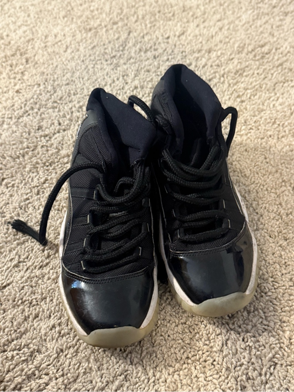 Nike Air Jordan’s Black Patent High-Top Sneakers